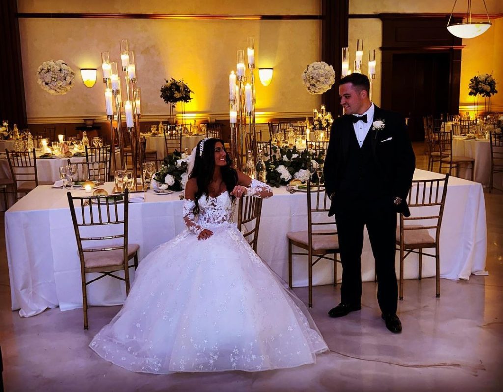 Newlyweds give loving look to each other